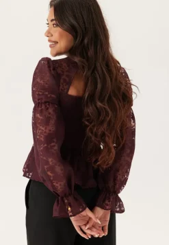 Chiara Forthi Peplum Blouse